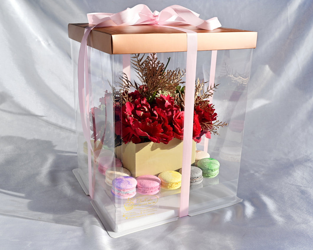 Sweet gift box with assorted French Macaroons and fresh flowers