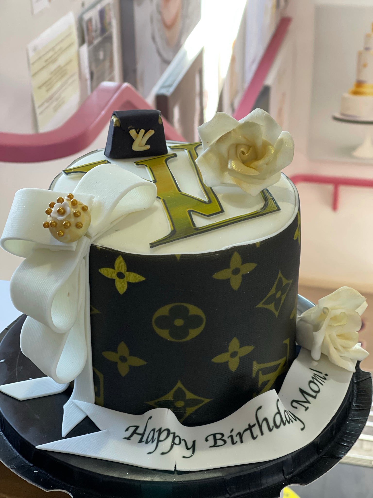 Working on this Customized Louis Vuitton Cake inspired cake